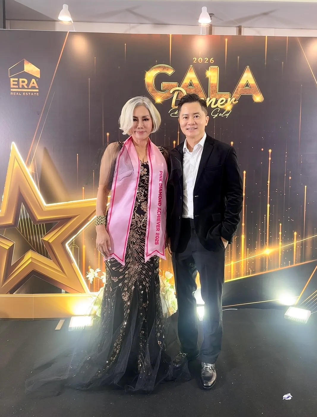 Eve Ang wearing the Pink Diamond Achiever 2025 sash at the ERA gala dinner