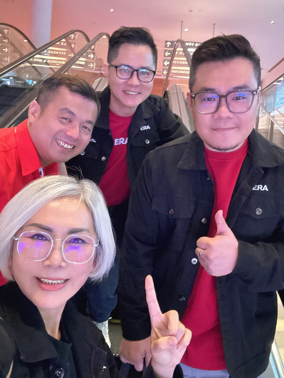 Eve Ang and teammates in ERA jackets heading to a gala