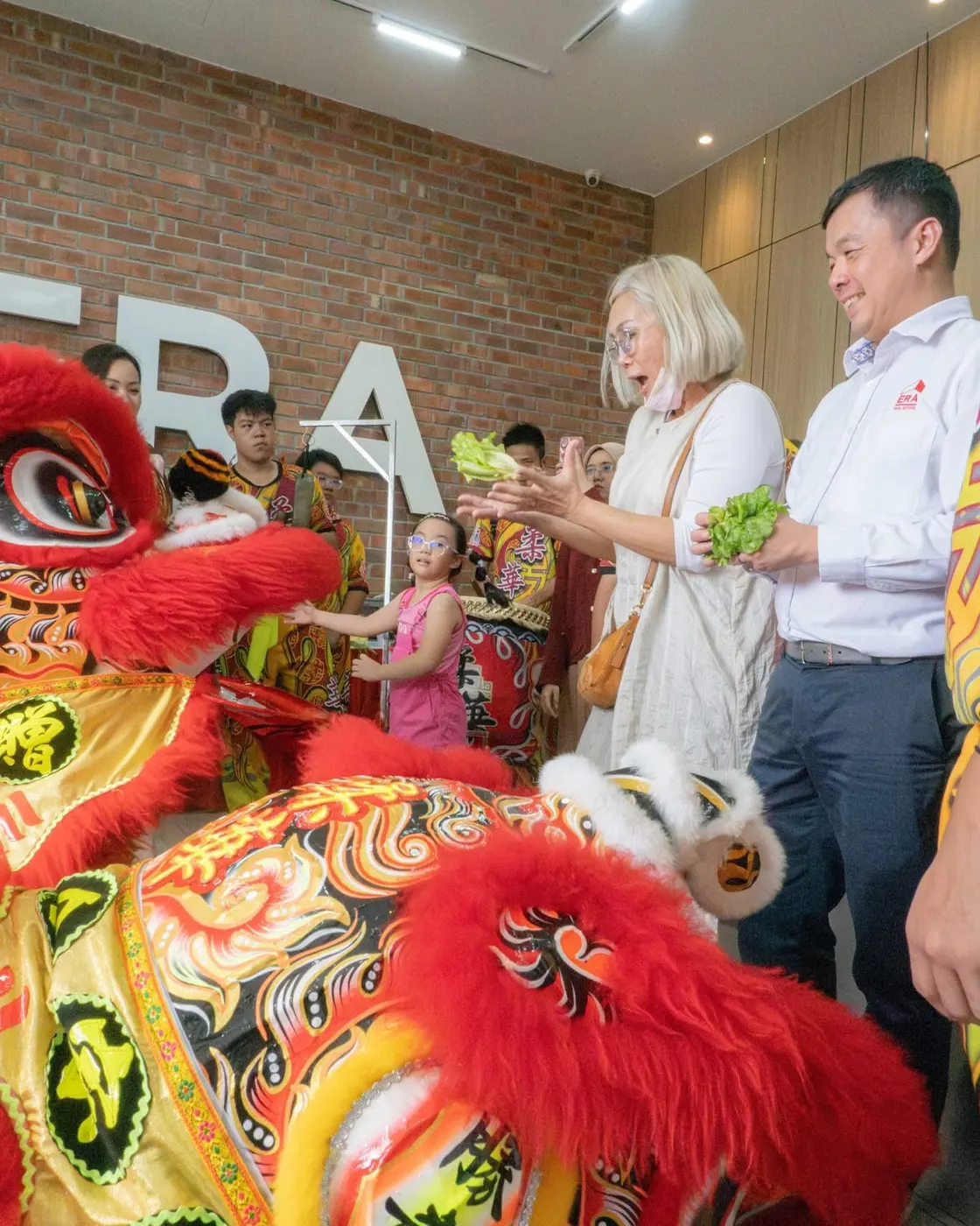 Lion dance at the ERA Malaysia office during Chinese New Year
