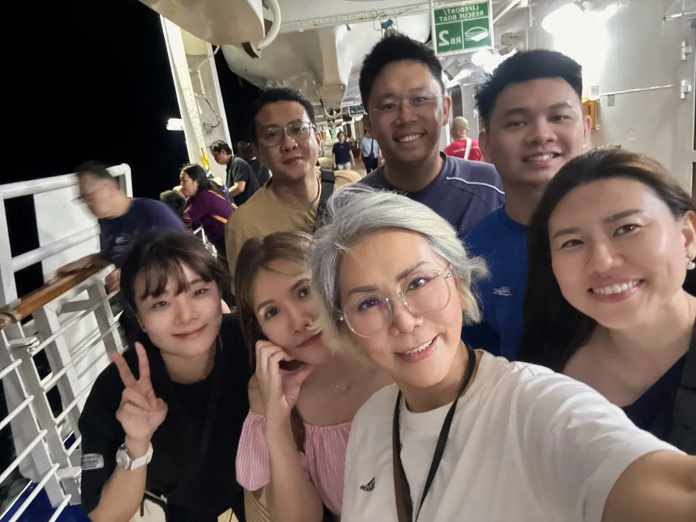 Eve Ang's team on a team cruise trip